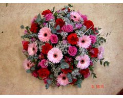 composition florale deuil coussin rond rose rouge