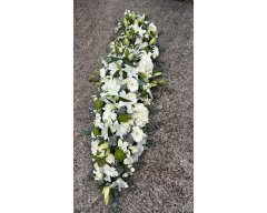 dessus cercueil blanc