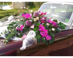 decoration vehicule rolls royce fleurs fuchsia